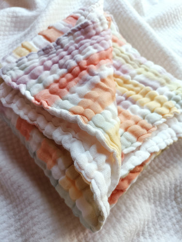 Creamy muslin blanket
